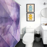 Bathroom with a Cotton Cat Purple Abstract Modern Boho Geometric Art Minimalist Shower Curtain-Cottoncat, white toilet, black wastebasket, white vanity with a round mirror, and two framed cartoon artwork pieces on the wall featuring a blue and a yellow character.