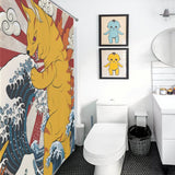 Bathroom with a unique Cotton Cat Funny Wave Monster Cat Shower Curtain-Cottoncat featuring a funny wave monster cat in Japanese art style. The waterproof and mildew-resistant curtain adds character, while framed pictures of blue and yellow characters adorn the wall above the toilet. The floor is black hexagonal tiles.