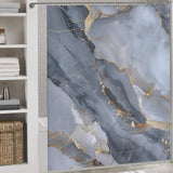 Luxury Gray Gold Stripe Abstract Marble Texture Art Shower Curtain-Cottoncat featuring an abstract marble texture in shades of grey, white, and gold. Shelves with folded towels, jars, and a woven basket are visible to the left.