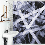 Modern bathroom with a Geometric Black and White Abstract Art Minimalist Line Shower Curtain-Cottoncat by Cotton Cat, adding a touch of minimalist abstract art. The sink features a mounted mirror and an elegant soap dispenser, enhancing the sophisticated polyester bathroom decor.
