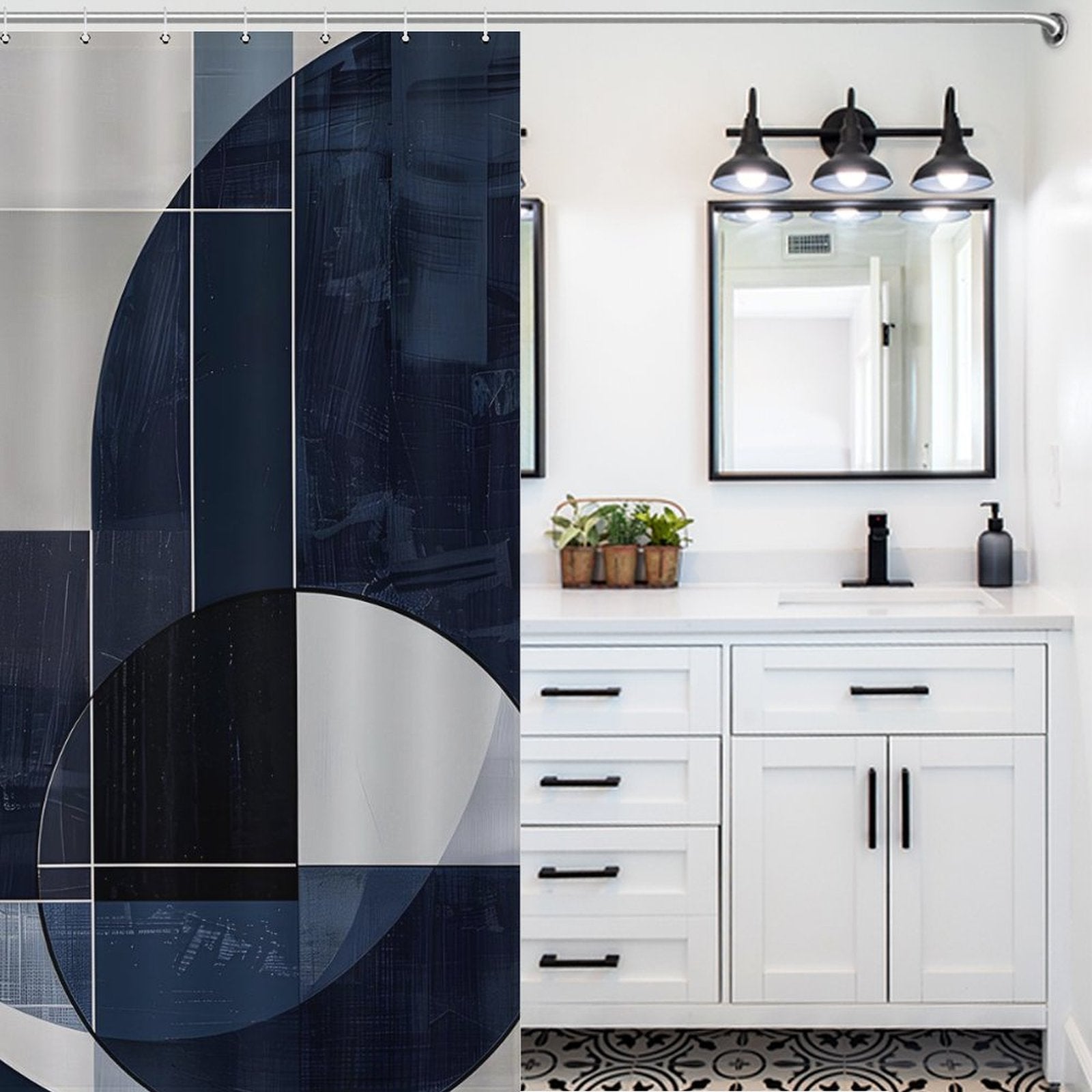 A modern bathroom with a white vanity, black handles, three mirror-mounted lights, a **Geometric Deep Blue Abstract Art Mid-Century Modern Style Shower Curtain-Cottoncat** by **Cotton Cat**, and a patterned floor.
