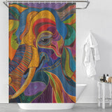 A Cotton Cat Colorful Abstract Elephant Shower Curtain-Cottoncat with vivid colors hangs in a white bathroom, featuring an abstract design that breathes life into the space. Nearby, a bathtub and a white bathrobe on a hook complete the serene setting.