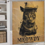 Shower curtain with a sepia-toned image of a funny cowboy cat wearing a hat and bandana, captioned "MEOWDY PARTNER" below. Shelves with folded towels and a wicker basket accentuate the bathroom. Product Name: Funny Cowboy Cool Meowdy Partner Cat Shower Curtain-Cottoncat Brand Name: Cotton Cat