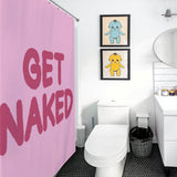 Modern bathroom with a bold pink "Simple Funny Letters Pink Get Naked Shower Curtain-Cottoncat." Two framed illustrations hang above the toilet, adding to the playful bathroom decor. A circular mirror is mounted on the wall, and funny black and white letters create an eye-catching focal point.