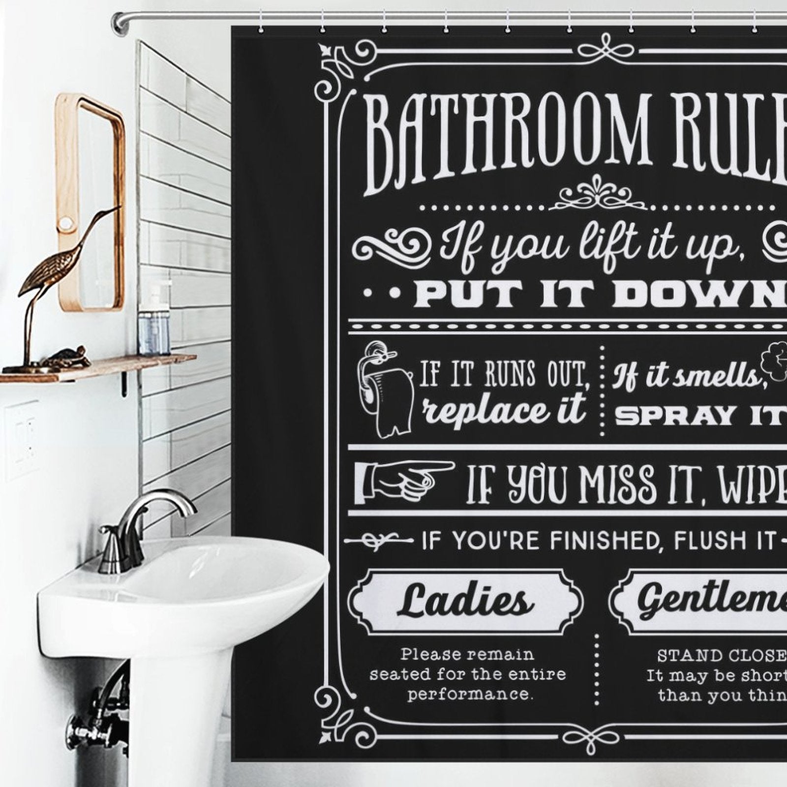 Funny Quotes Shower Curtain Black and White Fable Motto - Cottoncat with funny quotes and bathroom rules written in white text, such as "If you sprinkle when you tinkle, be a sweetie and wipe the seatie," hanging in a white-tiled bathroom with a sink and mirror. Made from durable polyester fabric, it adds a touch of black and white fable motto style.