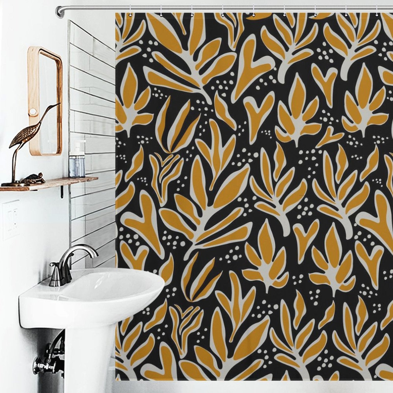 A bathroom with a white sink and a decorative brown bird figure on a shelf. The shower curtain features an **Abstract Vintage Boho Yellow Leaves Art Mid Century Leaf Shower Curtain-Cottoncat by Cotton Cat** in yellow and white on a dark background.