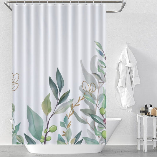 A bathroom with a Cotton Cat Watercolor Sage Green Eucalyptus Botanical Leaves Shower Curtain-Cottoncat, a hanging white towel, a white bathtub, and toiletries on a countertop. This elegant bathroom decor brings nature indoors with its serene and refreshing ambiance.