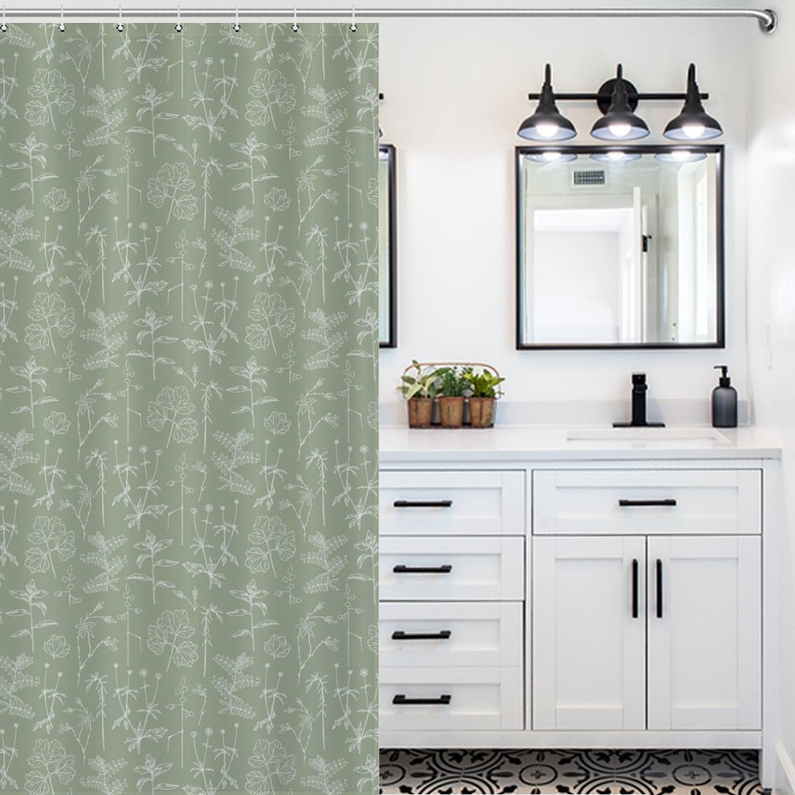 Bathroom with a white vanity, black hardware, dual sinks, and a Boho Retro Sage Green Herbs Flower Shower Curtain-Cottoncat. Above the vanity are two mirrors and a three-light fixture. The floor has a patterned design.
