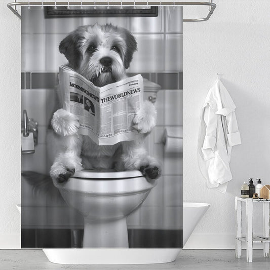 The Cotton Cat Black and White Funny Read Book Dog Shower Curtain features a dog sitting on a toilet, reading a newspaper titled "The World News." Made of waterproof fabric, it includes a white robe hanging on a hook next to a bathtub with various toiletries nearby.