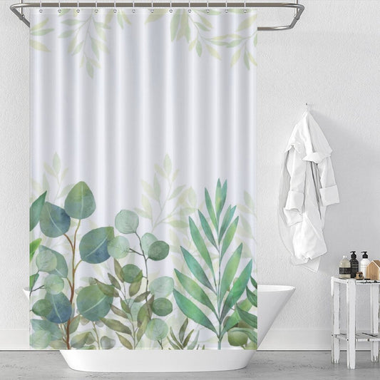 A bathroom with a white bathtub, a Natural Modern Ombre Sage Green White Leaf Shower Curtain-Cottoncat from Cotton Cat that's waterproof and mildew-resistant, a white robe on a hook, and toiletries on the counter.