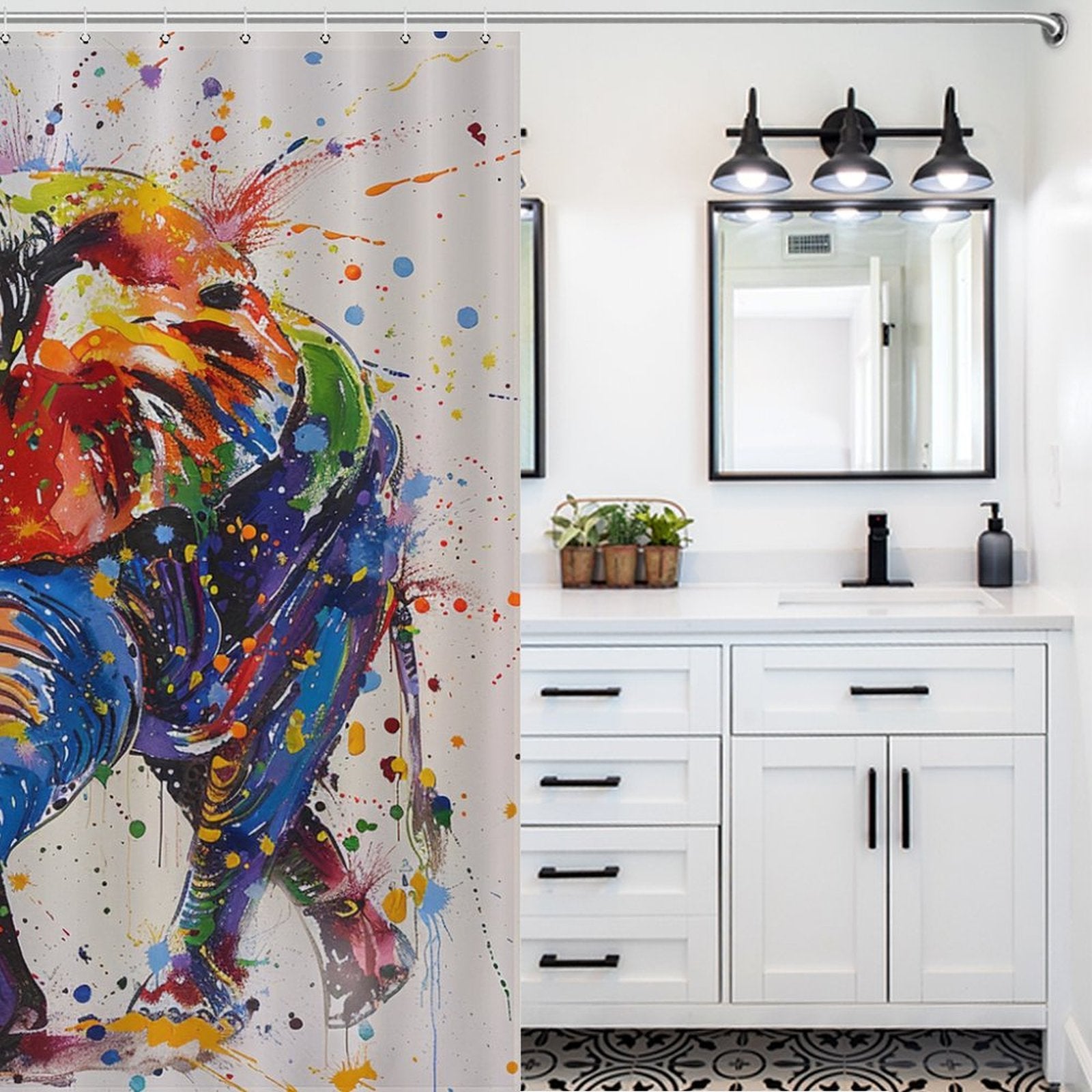 A bathroom with white cabinetry, black fixtures, and an Artistic Painting Happy Elephant Shower Curtain-Cottoncat by Cotton Cat featuring a colorful abstract design. There is a plant on the counter and a wall-mounted light fixture above the mirror. The high-quality polyester curtain adds a playful touch to the space.