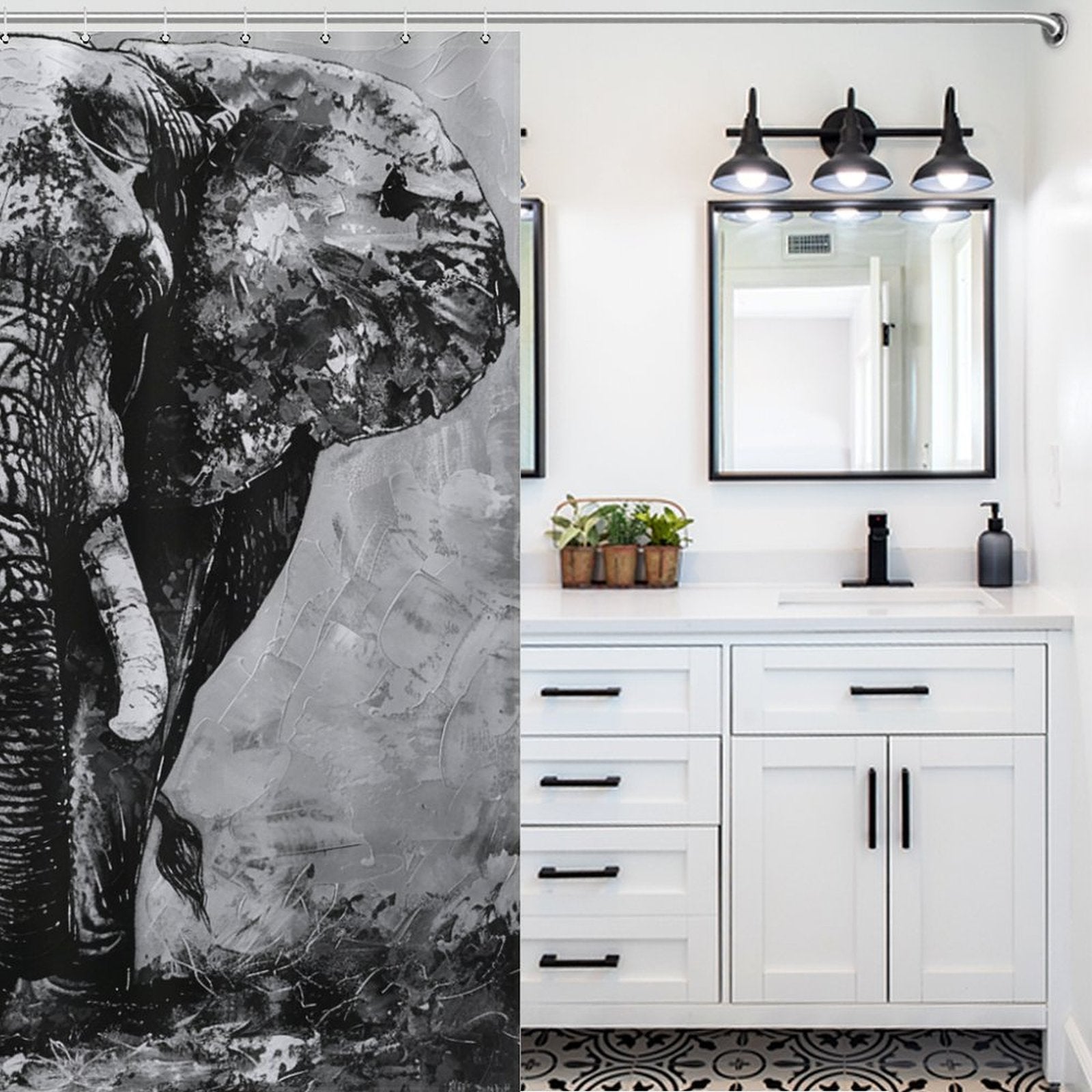 A modern bathroom with white cabinets, black fixtures, a double vanity, and a large mirror. The shower features an elegant Black and White Elephant Shower Curtain-Cottoncat by Cotton Cat that adds a touch of sophistication to the bathroom decor.