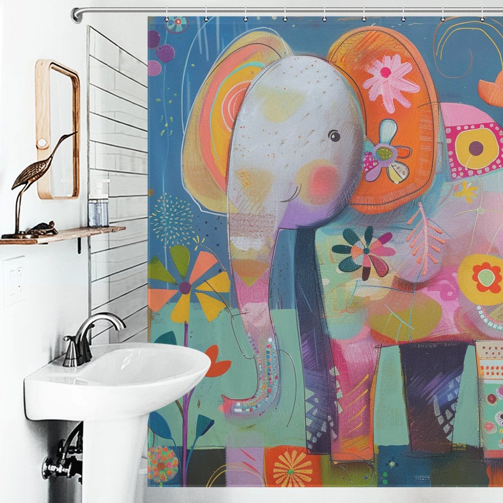 A bathroom with a whimsical, Cute Baby Cartoon Elephant Shower Curtain-Cottoncat by Cotton Cat, a white sink, a mirror with a wooden frame, and a bird-shaped soap dispenser holder creates playful bathroom decor.