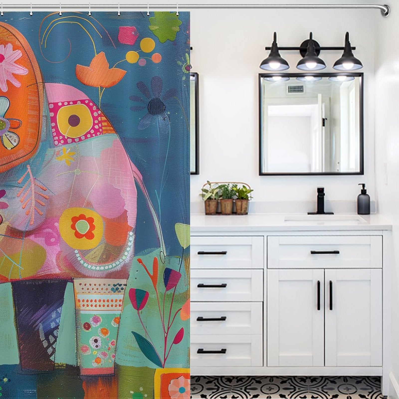 A bathroom with a whimsical **Cute Baby Cartoon Elephant Shower Curtain-Cottoncat** featuring a colorful elephant pattern on the left, a white vanity with a sink, a mirror above it, and three small planters and a black soap dispenser on the counter by **Cotton Cat**.