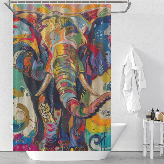 A bathroom with a white tub, a vibrant ambiance, and the Multi Colored Happy Elephant Shower Curtain-Cottoncat adding a playful touch. White towels hang neatly on a wall hook.