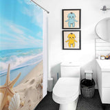 A beach-themed bathroom with an Ocean Beach Starfish Seashell Shower Curtain from Cotton Cat.