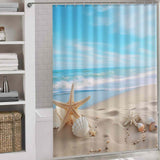 A Cotton Cat Ocean Beach Starfish Seashell Shower Curtain featuring a starfish and shells by the ocean.
