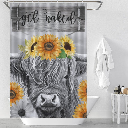 Shower curtain with a Highland cow design and sunflower accents, featuring the text "get naked." A white robe, towels, and toiletries enhance this minimalist bathroom. Perfect for adding a touch of Highland Cow Black and White Funny Letters Sunflower Get Naked Shower Curtain-Cottoncat by Cotton Cat.