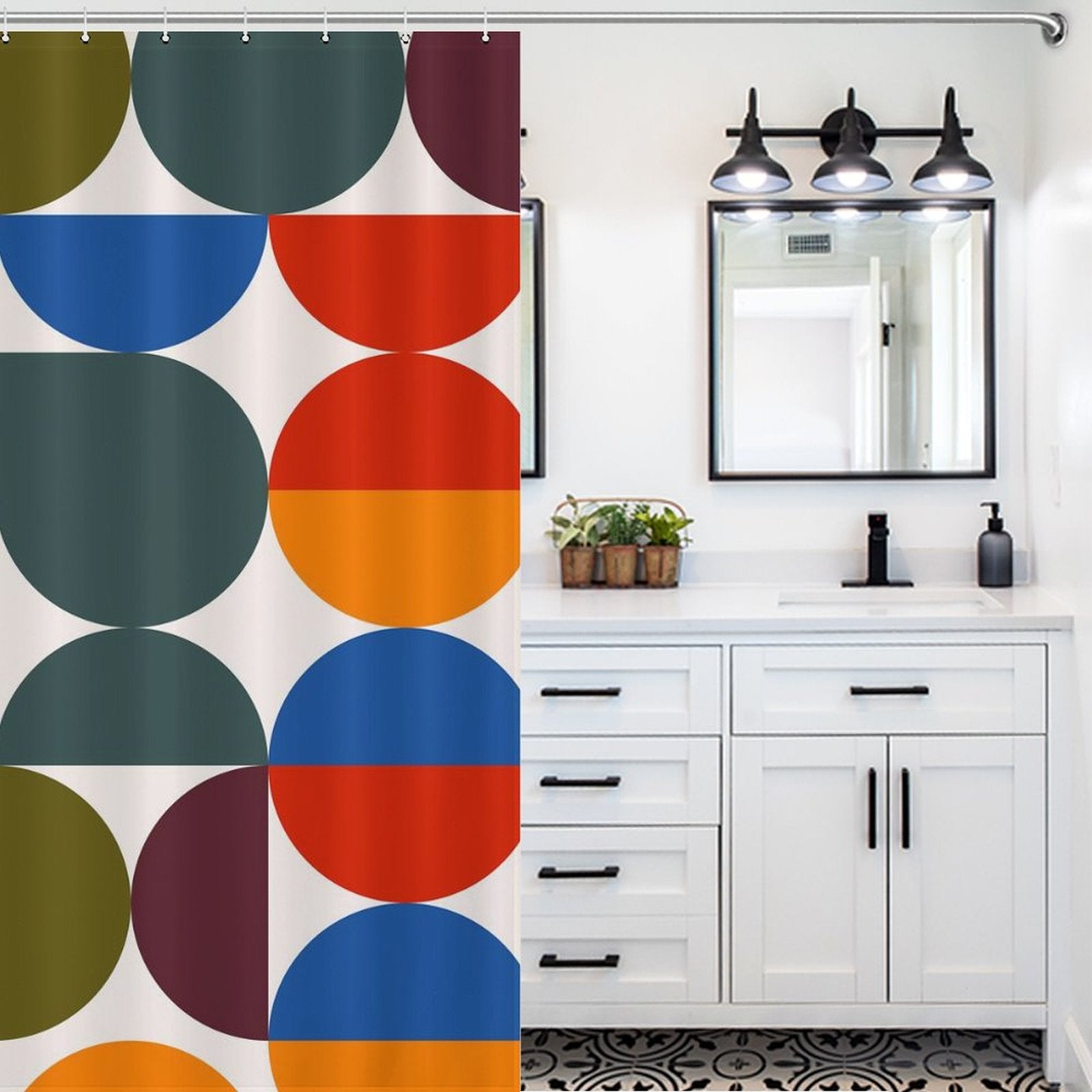 A bathroom with a white vanity and black fixtures, featuring an Abstract Modern Art Rainbow Polka Dot Geometric Shower Curtain-Cottoncat adorned with half-circle designs in vibrant green, red, blue, and yellow hues from Cotton Cat.