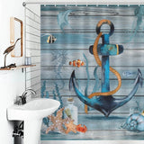 Create a coastal-themed bathroom with a waterproof polyester Coastal Anchor Shower Curtain by Cotton Cat and sea life accents.