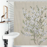 A bathroom with a sink, a mirror, and a Retro Green Flower Shower Curtain-Cottoncat featuring white blossoms on a beige background by Cotton Cat.