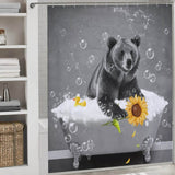 A Funny Sunflower Bear Shower Curtain featuring a bear in a tub surrounded by sunflowers, perfect for bathroom décor, from Cotton Cat.