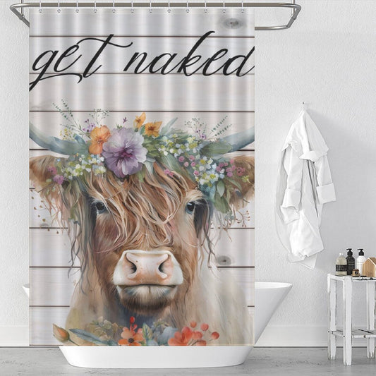 A Funny Letters Get Naked Flower Highland Cow Shower Curtain-Cottoncat by Cotton Cat featuring a cow illustration wearing a flower crown and the funny letters "get naked" hangs in a white bathroom with a bathtub and toiletries, adding charming Bathroom Humor Decor.