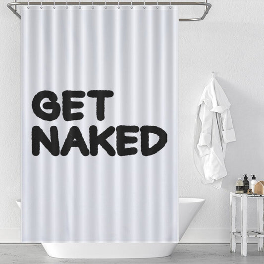 A white bathroom houses a sleek black and white shower curtain featuring the bold, funny letters "GET NAKED." The Funny Letters Black and White Get Naked Shower Curtain-Cottoncat by Cotton Cat is complemented by a bathtub, white robe, and tasteful bathroom accessories.