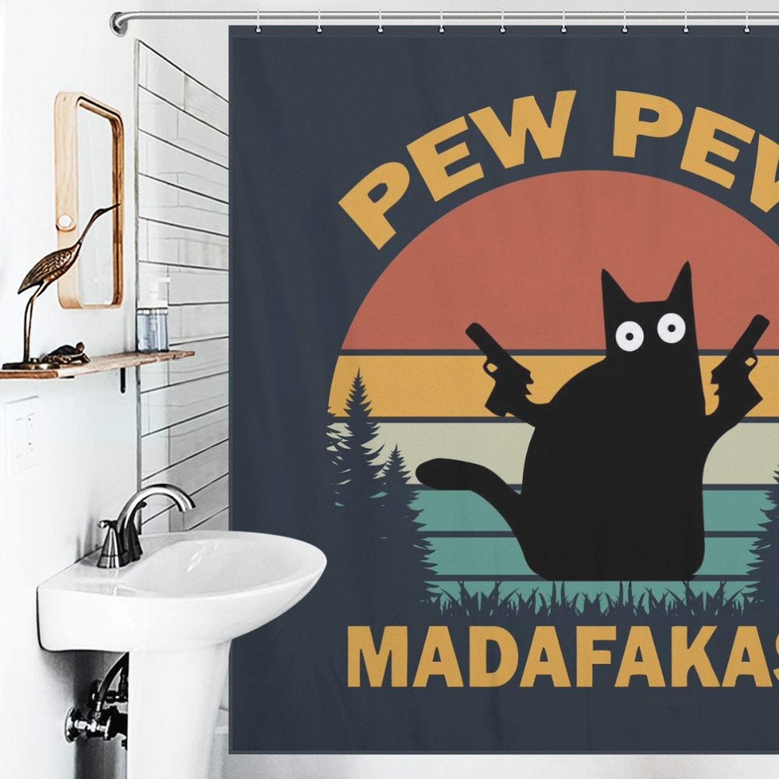 A bathroom featuring a quirky Funny Black Crazy Cat with Gun Shower Curtain-Cottoncat by Cotton Cat, with a funny black crazy cat holding guns against a retro-style sunset and trees background, adding unique bathroom decor with the text "Pew Pew Madafakas.