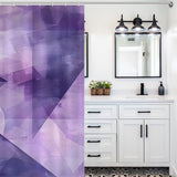 Modern bathroom with a Purple Abstract Modern Boho Geometric Art Minimalist Shower Curtain-Cottoncat by Cotton Cat, white vanity with black handles, dual rectangular mirrors, and a three-light fixture above. Decorative tile floor and small plants on the counter enhance the minimalist bathroom decor.