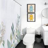 A bathroom with a Watercolor Sage Green Eucalyptus Botanical Leaves Shower Curtain-Cottoncat by Cotton Cat, white toilet, black wastebasket, sink, and two framed drawings of colorful characters on the wall above the toilet.