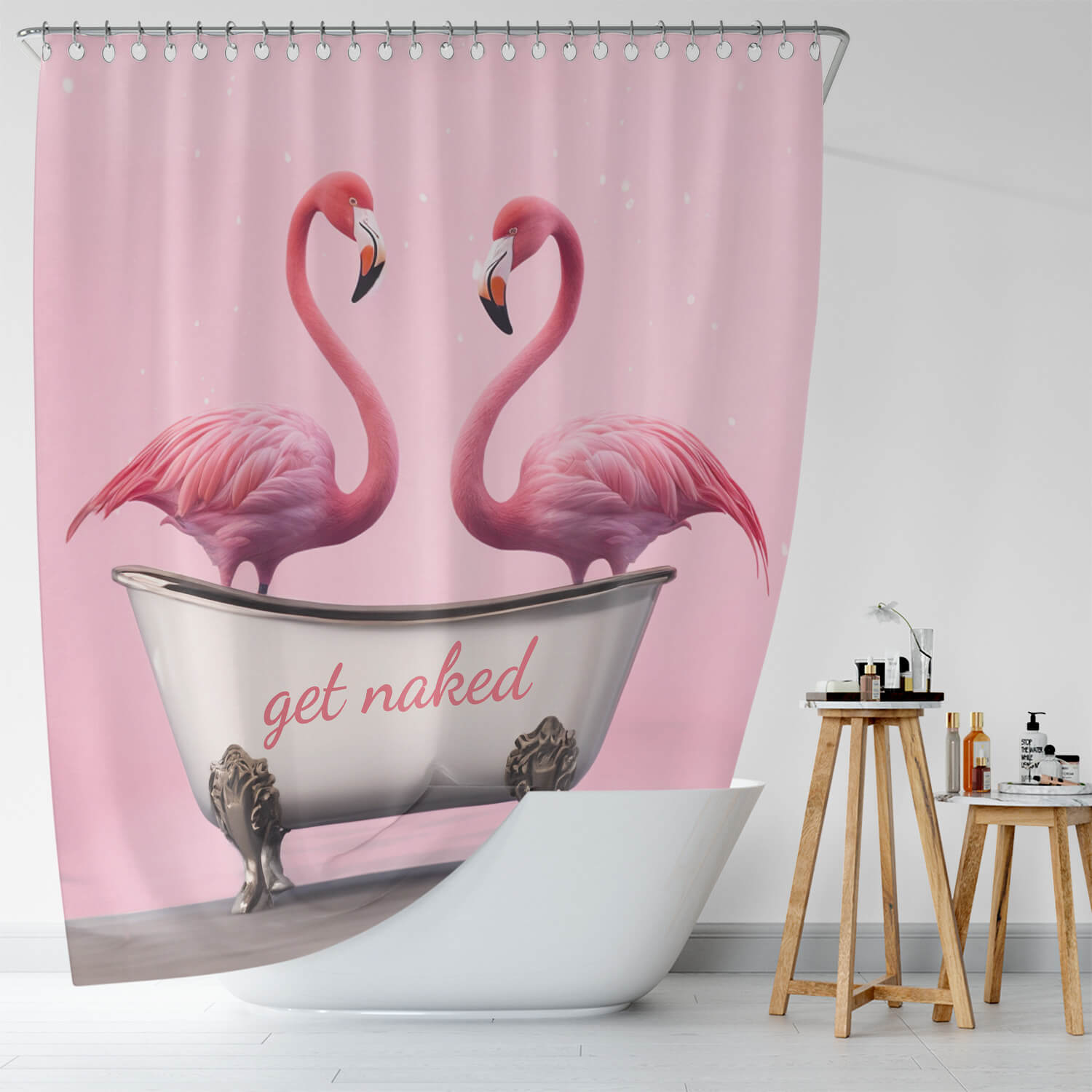 Two flamingos in a bathtub with a Get Naked Flamingo Shower Curtain from Cotton Cat.