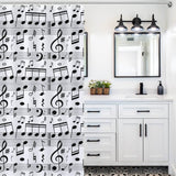 Transform your bathroom decor with a vibrant Cotton Cat shower curtain adorned in beautiful music notes.