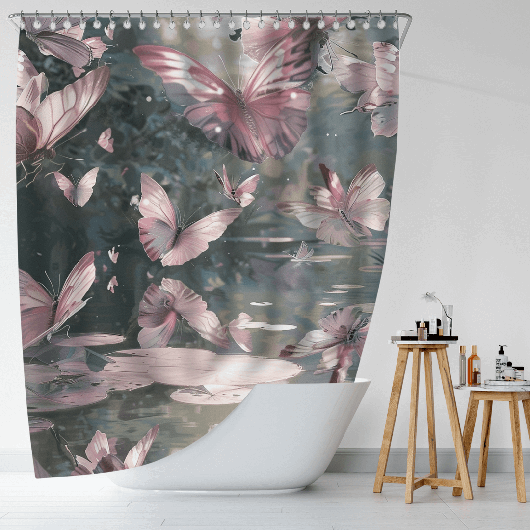 The Watercolor Colorful Monarch Butterfly Flower Garden Shower Curtain by Cotton Cat is beautifully displayed in a bathroom featuring a white bathtub and a wooden stool holding toiletries, showcasing its design of pink monarch butterflies over a reflective water surface.