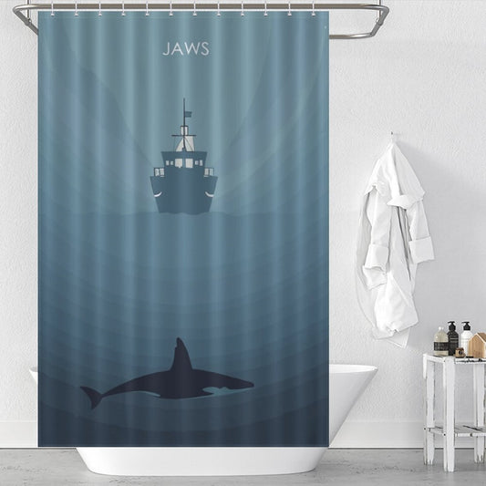 Elevate your bathroom decor with the Jaws Shark Shower Curtain from Cotton Cat, featuring a captivating ship amidst the depths of the ocean alongside a majestic shark.
