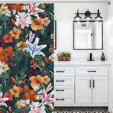 A bathroom with a Vintage Lily Flower Shower Curtain from Cotton Cat.